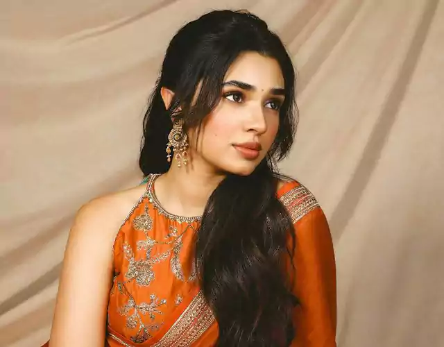 Krithi Shetty Exudes Elegance Draped in Orange